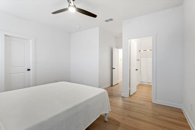 bedroom featuring ceiling fan and light hardwood / wood-style floors