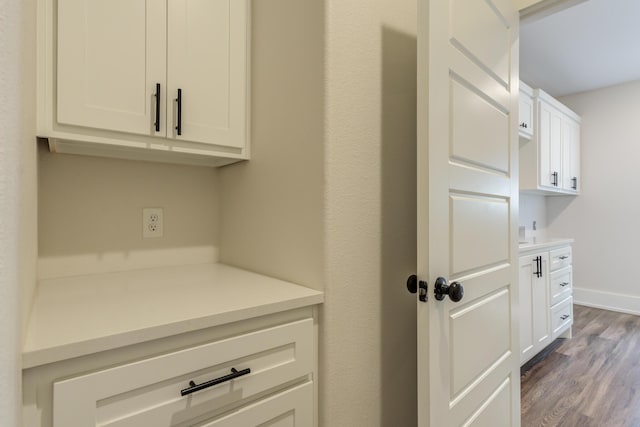 4603 140th St, Lubbock, TX 79424 - detailed view of wood finished floors and baseboards