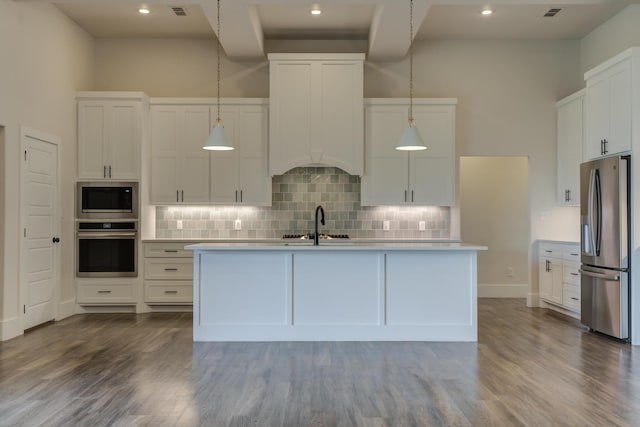 4603 140th St, Lubbock, TX 79424 - kitchen with stainless steel appliances, light countertops, backsplash, dark wood-style floors, and recessed lighting