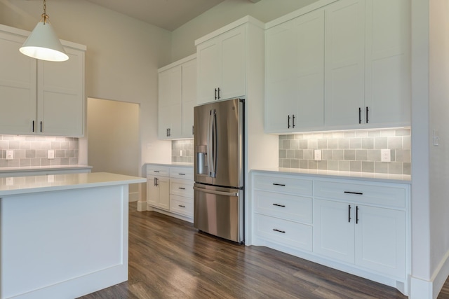 4603 140th St, Lubbock, TX 79424 - kitchen featuring stainless steel fridge with ice dispenser, decorative backsplash, and light countertops