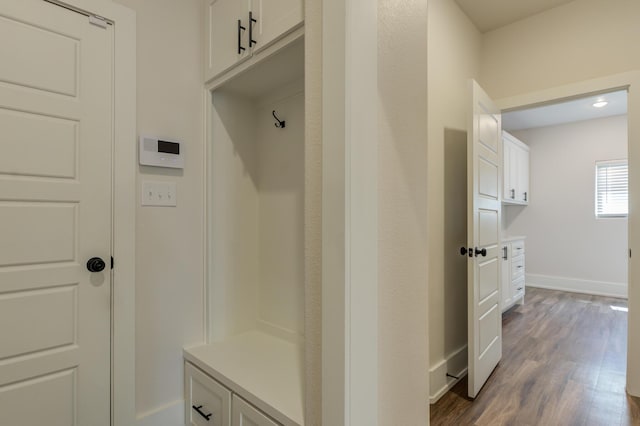 4603 140th St, Lubbock, TX 79424 - mudroom featuring dark wood finished floors and baseboards