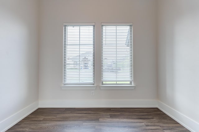 4603 140th St, Lubbock, TX 79424 - spare room featuring dark wood-type flooring and baseboards