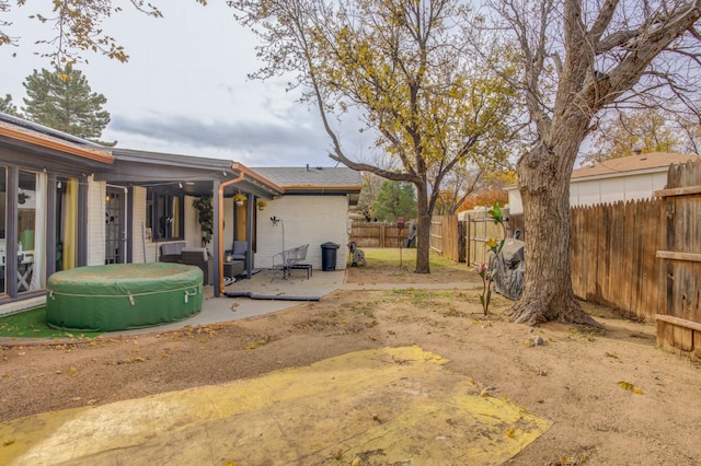 view of yard featuring a patio