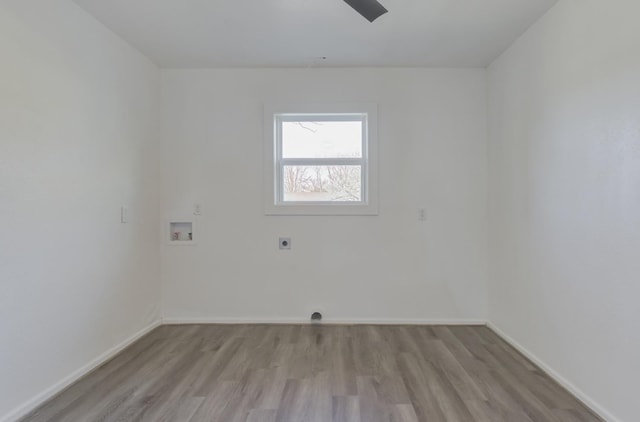 washroom featuring laundry area, washer hookup, baseboards, light wood-type flooring, and electric dryer hookup