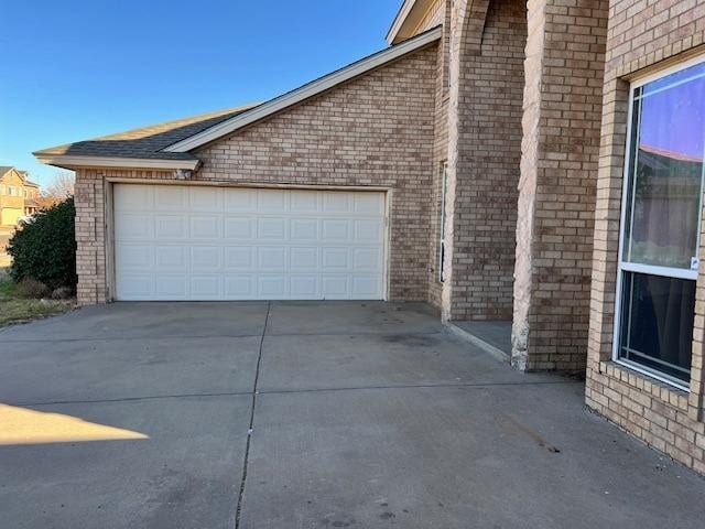 exterior space with a garage