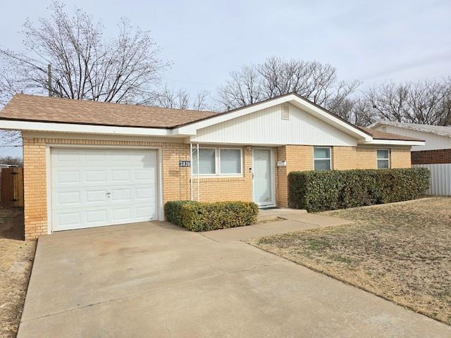 ranch-style home with a garage