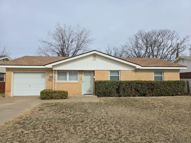 ranch-style house featuring a garage