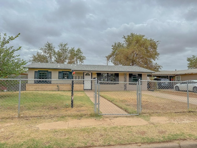 ranch-style home with a front yard