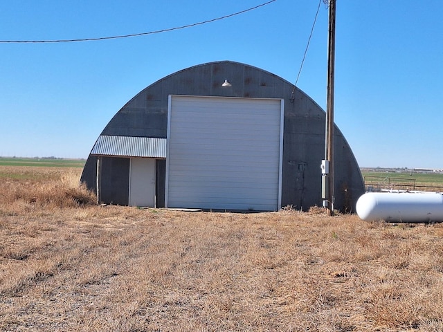 garage with a rural view