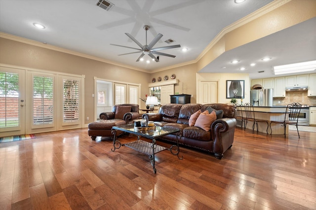 314 York Ave, Lubbock, TX 79416 - living area with hardwood / wood-style flooring, crown molding, a ceiling fan, recessed lighting, and french doors