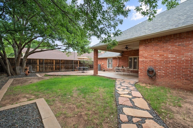 314 York Ave, Lubbock, TX 79416 - view of yard featuring a ceiling fan and a patio