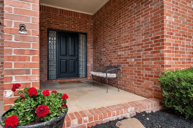314 York Ave, Lubbock, TX 79416 - view of exterior entry featuring brick siding