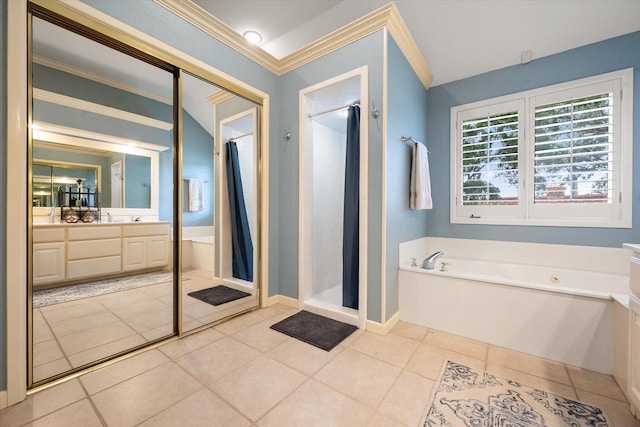314 York Ave, Lubbock, TX 79416 - full bathroom with vanity, a bath, a shower stall, ornamental molding, and tile patterned floors