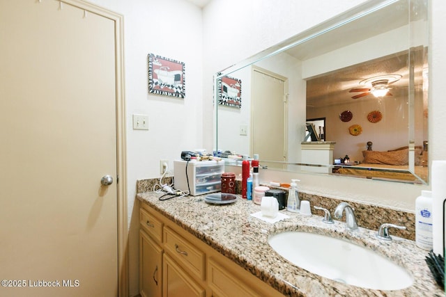 4610 63rd St, Lubbock, TX 79414 - bathroom with vanity and a ceiling fan