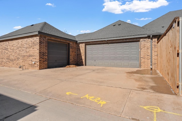 view of side of home with a garage