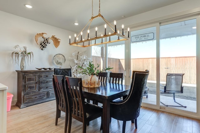 dining area with light hardwood / wood-style flooring