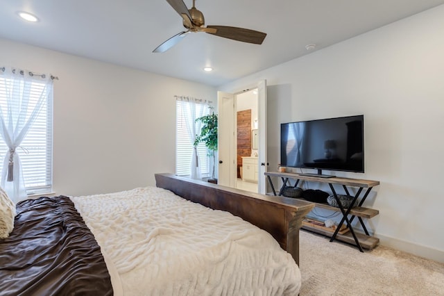 carpeted bedroom with ceiling fan