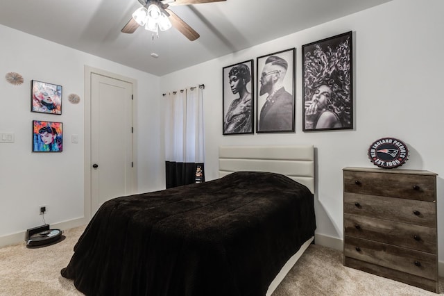 bedroom featuring ceiling fan and carpet flooring