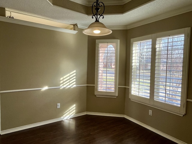 4910 102nd St, Lubbock, TX 79424 - spare room featuring wood finished floors and crown molding