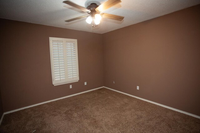 unfurnished room with carpet floors, a textured ceiling, and ceiling fan