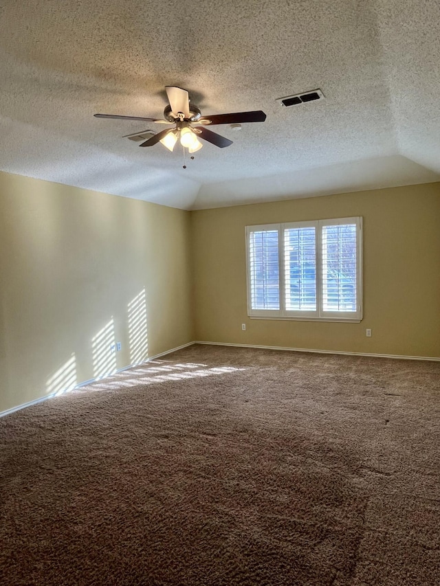 4910 102nd St, Lubbock, TX 79424 - spare room featuring ceiling fan, a textured ceiling, and carpet flooring