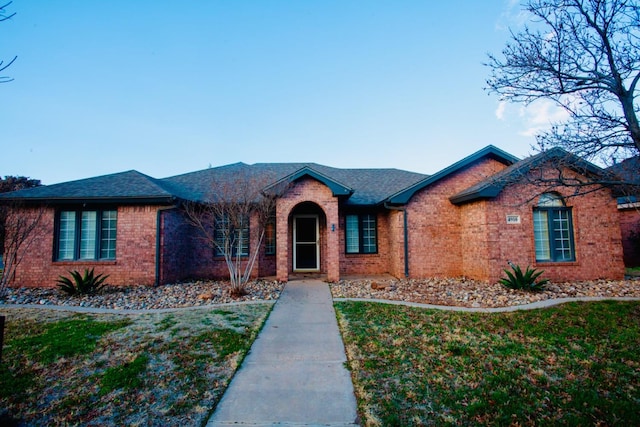 view of front of home with a front yard