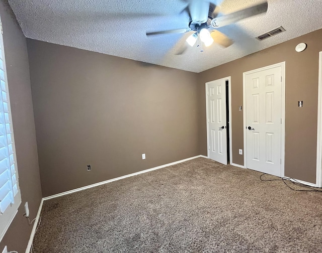 4910 102nd St, Lubbock, TX 79424 - unfurnished room featuring ceiling fan, carpet floors, a textured ceiling, and a smoke detector