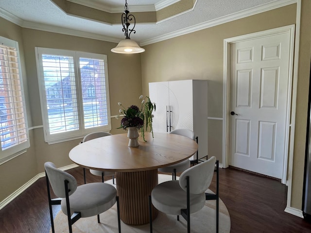 4910 102nd St, Lubbock, TX 79424 - dining room with dark wood-style floors, crown molding, and a raised ceiling