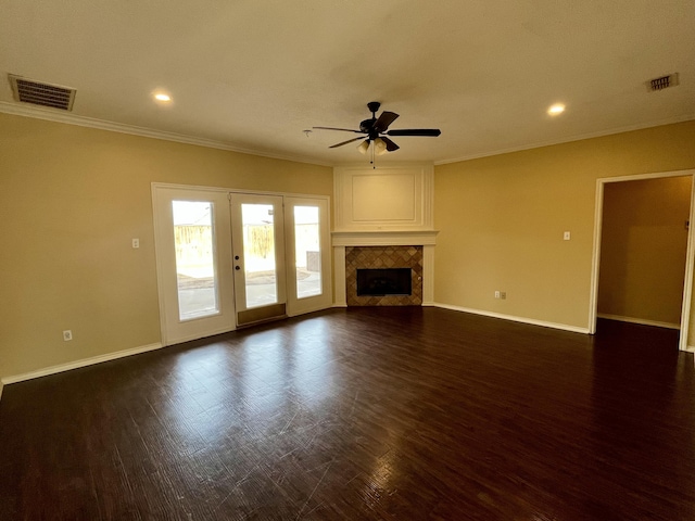 4910 102nd St, Lubbock, TX 79424 - unfurnished living room featuring a ceiling fan, ornamental molding, dark wood finished floors, recessed lighting, and a fireplace