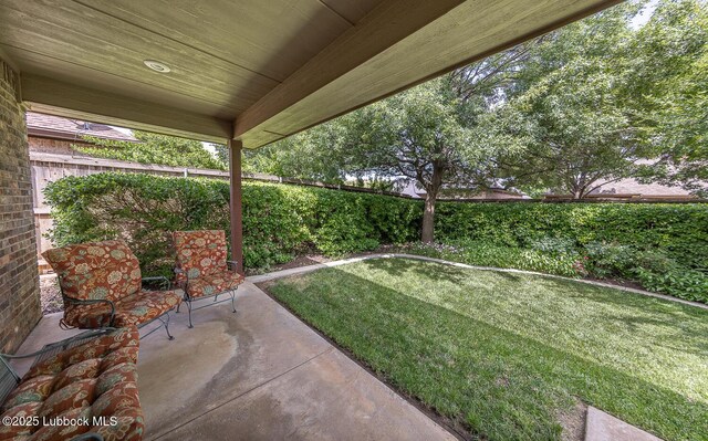 3914 101st St, Lubbock, TX 79423 - fenced yard with a patio area