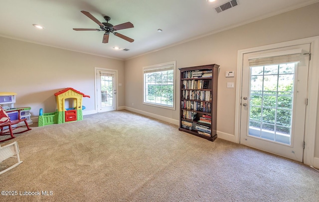 3914 101st St, Lubbock, TX 79423 - rec room with crown molding, carpet flooring, a ceiling fan, and recessed lighting