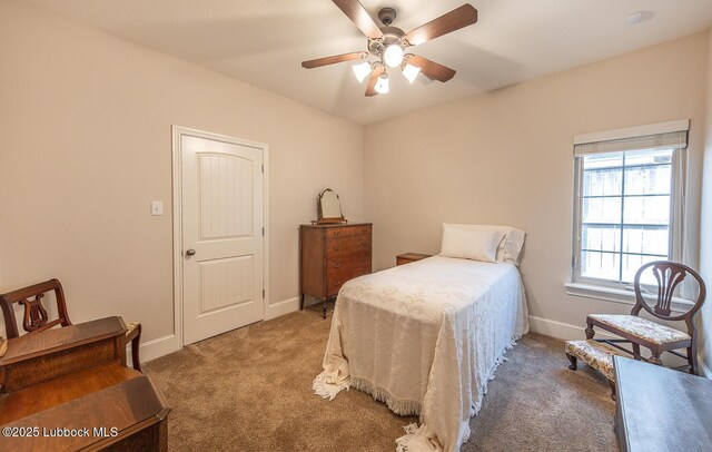 3914 101st St, Lubbock, TX 79423 - bedroom with light carpet and ceiling fan