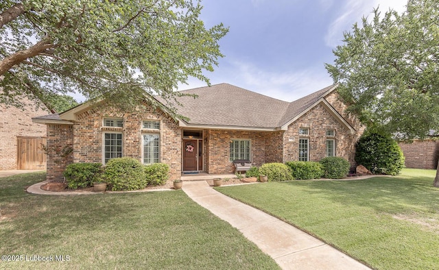 3914 101st St, Lubbock, TX 79423 - traditional-style house featuring brick siding and a shingled roof