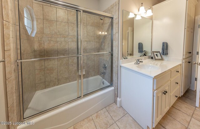 3914 101st St, Lubbock, TX 79423 - full bath featuring vanity, enclosed tub / shower combo, and tile patterned floors