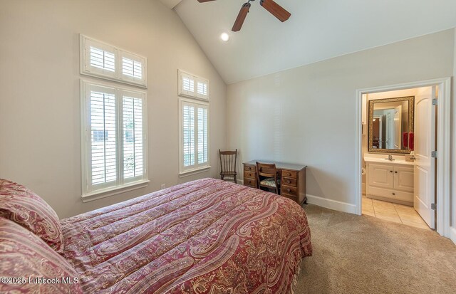 3914 101st St, Lubbock, TX 79423 - bedroom with light colored carpet, high vaulted ceiling, connected bathroom, recessed lighting, and ceiling fan