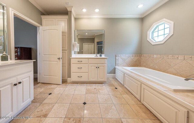 3914 101st St, Lubbock, TX 79423 - bathroom featuring two vanities, crown molding, a bath, recessed lighting, and tile patterned floors
