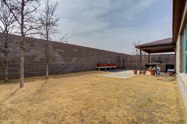 3711 128th St, Lubbock, TX 79423 - fenced backyard featuring a patio