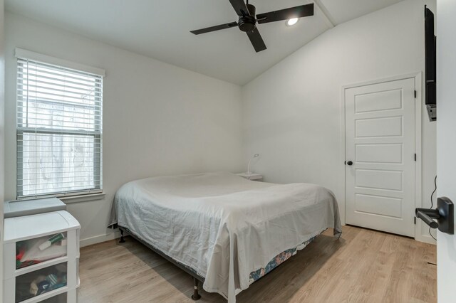 3711 128th St, Lubbock, TX 79423 - bedroom with vaulted ceiling, light wood finished floors, and ceiling fan