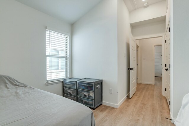 3711 128th St, Lubbock, TX 79423 - bedroom featuring multiple windows and light wood finished floors