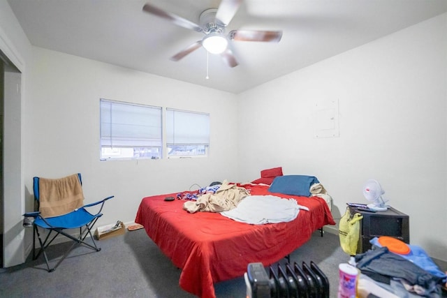 bedroom with ceiling fan and carpet flooring