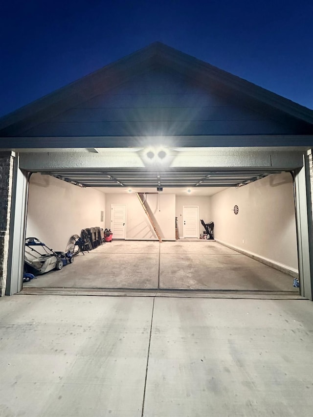 view of garage at night