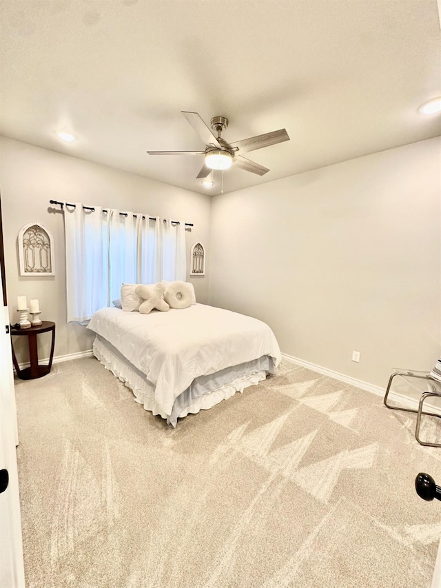 bedroom featuring carpet and ceiling fan