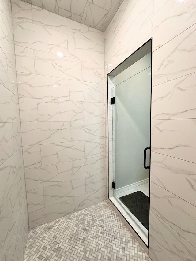 bathroom with an enclosed shower