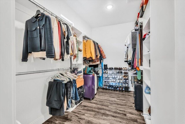 6803 52nd St, Lubbock, TX 79407 - walk in closet with wood finished floors