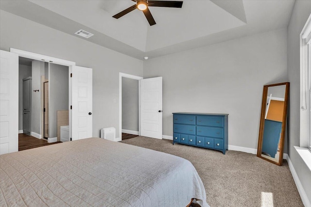 6803 52nd St, Lubbock, TX 79407 - bedroom featuring carpet flooring, a ceiling fan, baseboards, and a tray ceiling