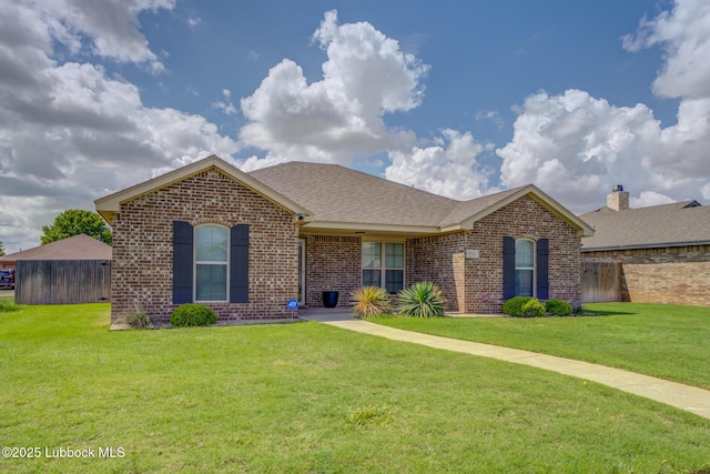 5207 Jarvis St, Lubbock, TX 79416 - ranch-style house featuring brick siding and a shingled roof