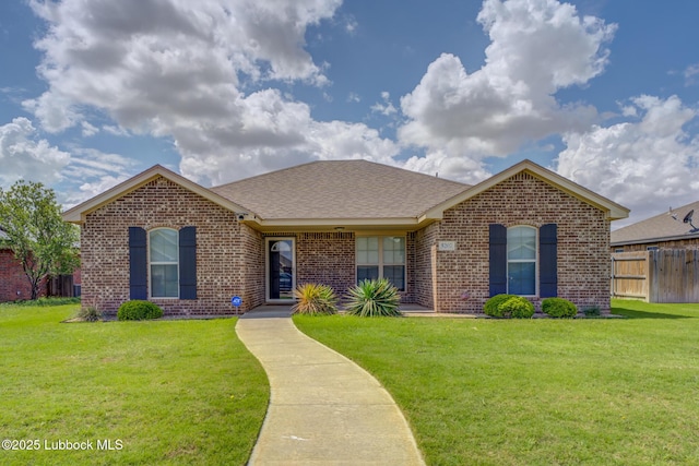 5207 Jarvis St, Lubbock, TX 79416 - view of front facade with brick siding and roof with shingles
