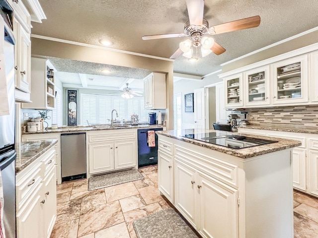 kitchen featuring sink, white cabinetry, a center island, light stone countertops, and black appliances