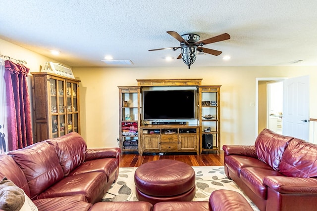 4306 Alcove Ave, Lubbock, TX 79407 - living room with a textured ceiling, dark wood finished floors, a ceiling fan, and recessed lighting