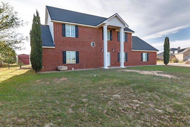 4306 Alcove Ave, Lubbock, TX 79407 - neoclassical home with roof with shingles, a front lawn, and brick siding